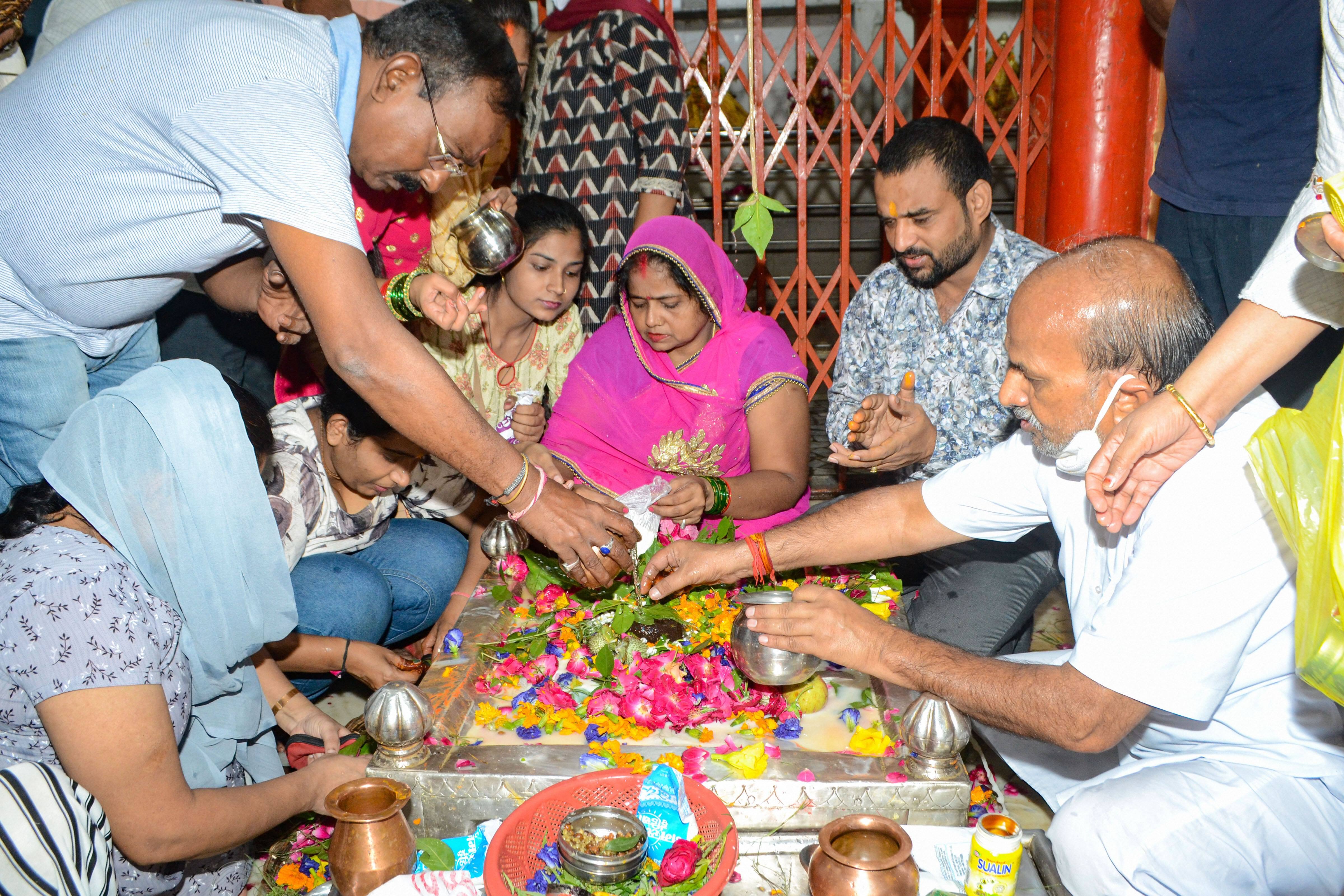 Devotees worshipped at a temple in Kanpur