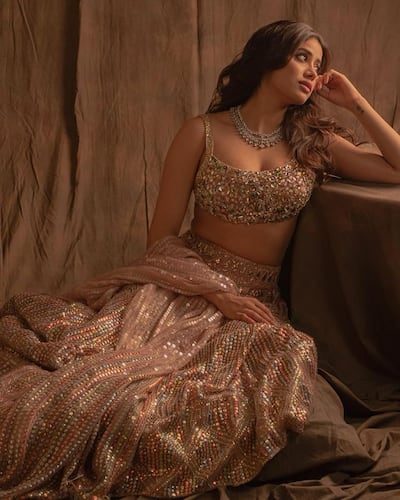 Janhvi Kapoor is a sight to behold in a nude colour lehenga