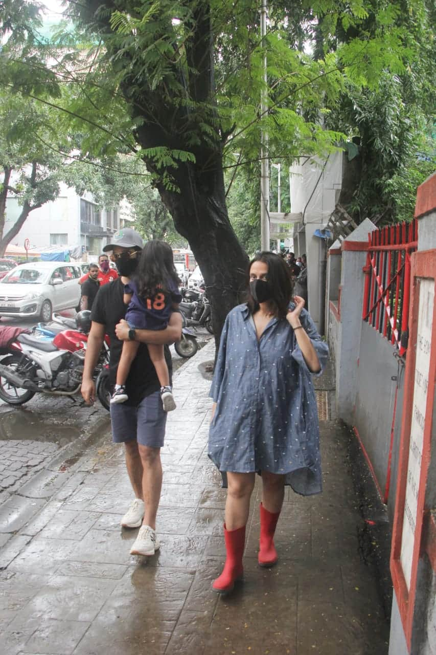 Neha wore striking red colour gumboots