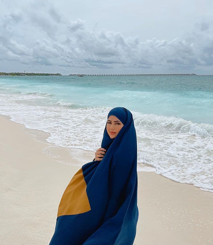 Sana Khan poses on the beach