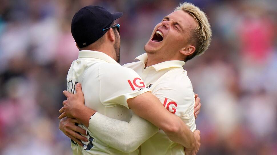 England all-rounder Sam Curran celebrates the dismissal of Indian captain Virat Kohli on Day 4 of the second Test at Lord's. (Photo: PTI)