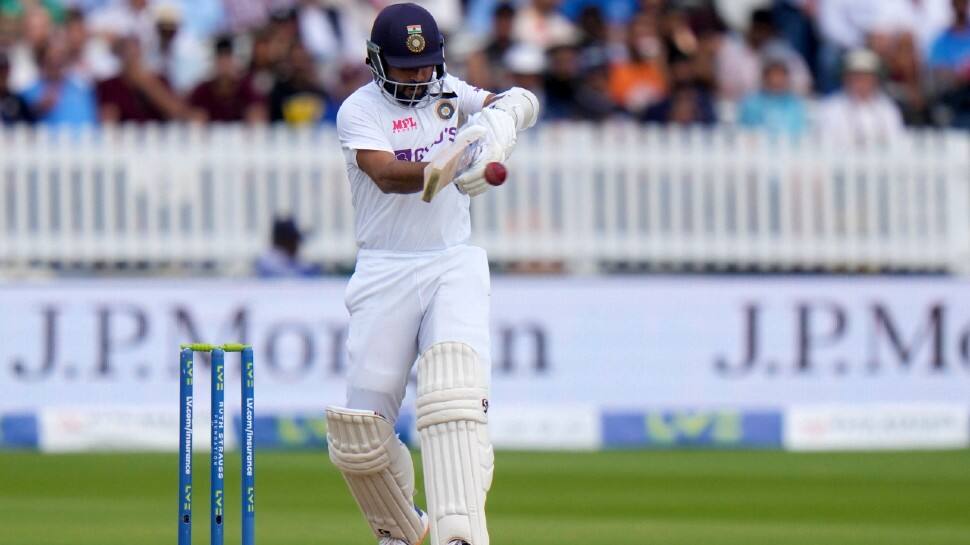 Indian vice-captain Ajinkya Rahane smashes a boundary en route to scoring his 24th half-century in Test cricket. (Photo: PTI)