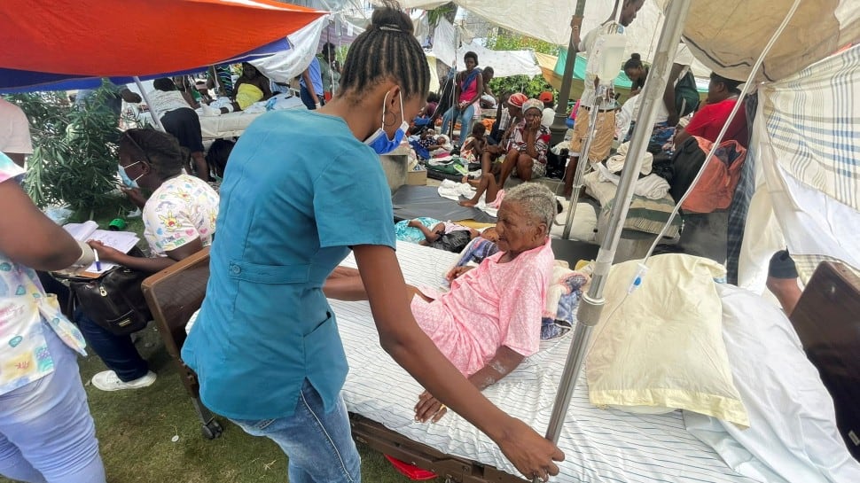 Haiti hospitals overwhelmed after quake, death toll rises to 1,400