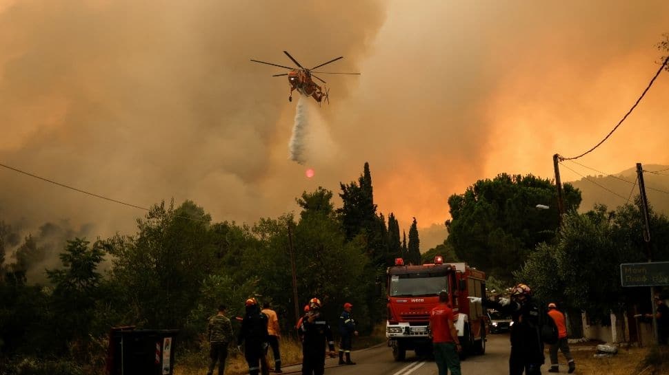 Firefighters, helicopters at work