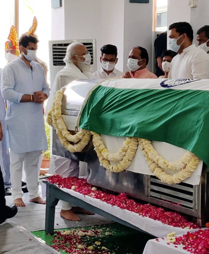 PM Modi while paying his last respects to Singh