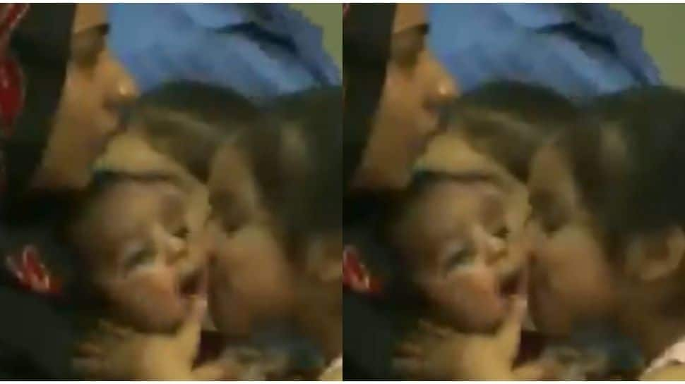 Young girl kisses little baby while being evacuated from Kabul to India- Watch viral video