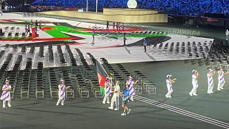 The Afghanistan national flag being displayed at the Tokyo Paralympics opening ceremony although no Afghan para athlete will be competing due to Taliban crisis. (Photo: IANS)