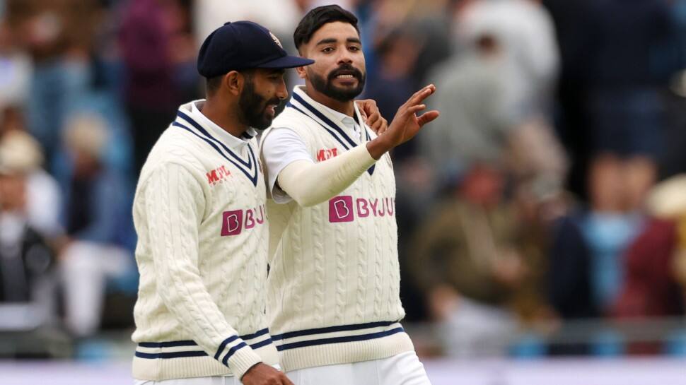 Indian paceman Mohammed Siraj interacts with Jasprit Bumrah on Day 2 of the third Test at Leeds. (Photo: PTI)