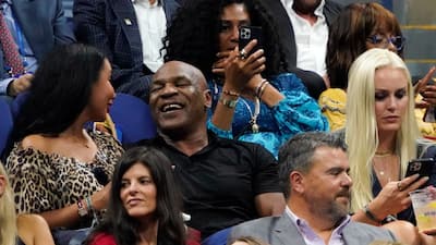 Mike Tyson and Lindsey Vonn enjoy opening day's play