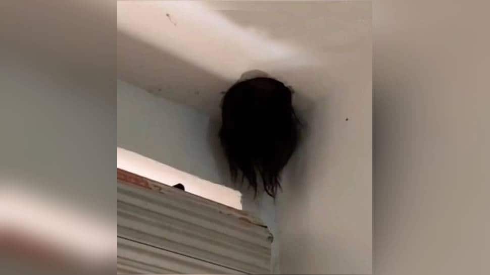 Scary! Girl's head dangles from ceiling like in horror movies, here's what happened next