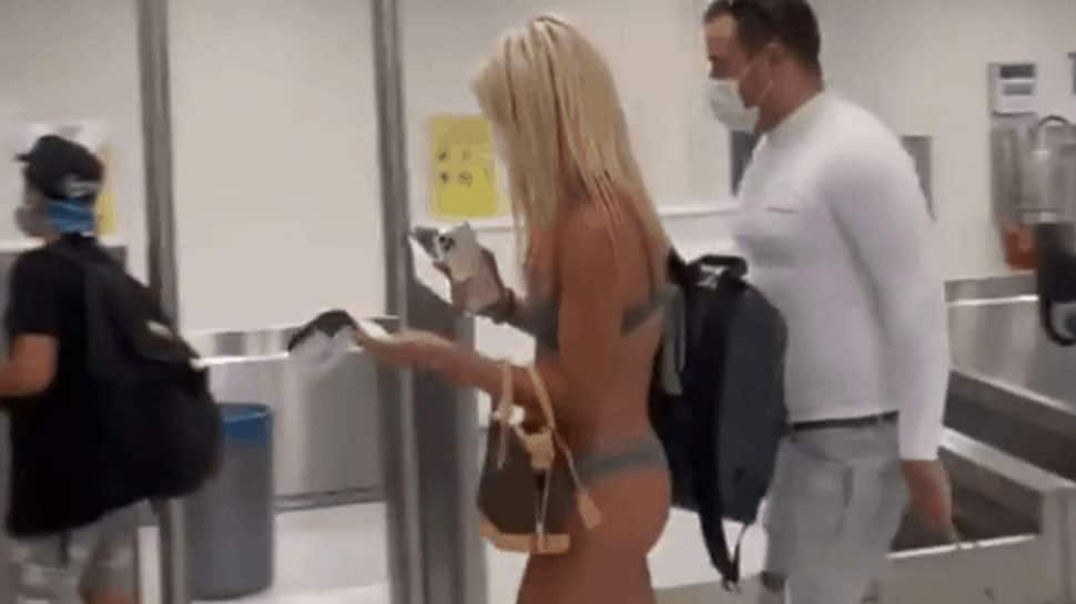Viral video: Woman walks into US airport wearing just a bikini and face mask