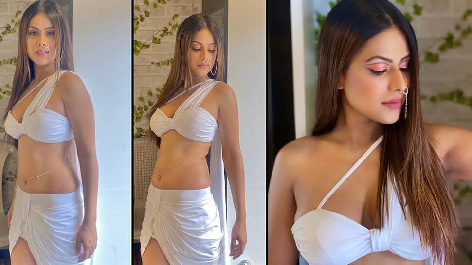 Nia Sharma&#039;s smouldering look in white bralette and slit skirt is too hot to handle - Watch