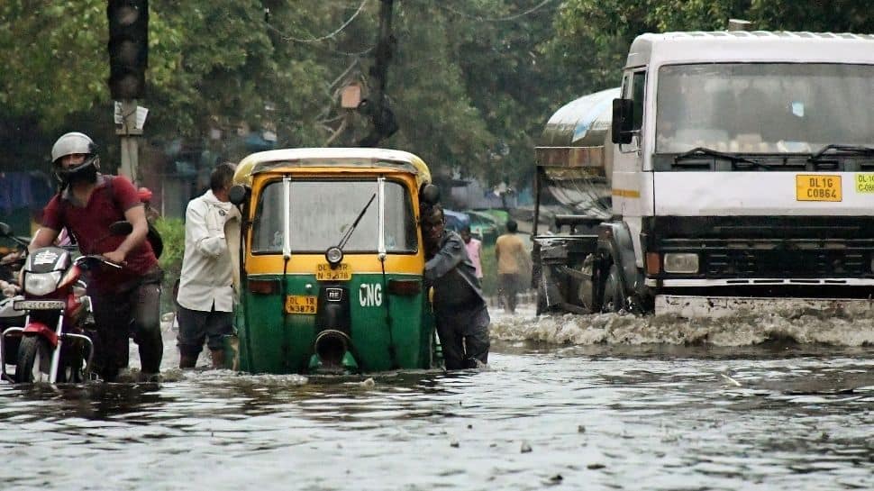 Delhi Rains: Flooded Streets, Heavy Traffic As Record Downpour Lashes ...