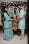 Arjun Bijlani and his wife celebrating Ganesh Chaturthi