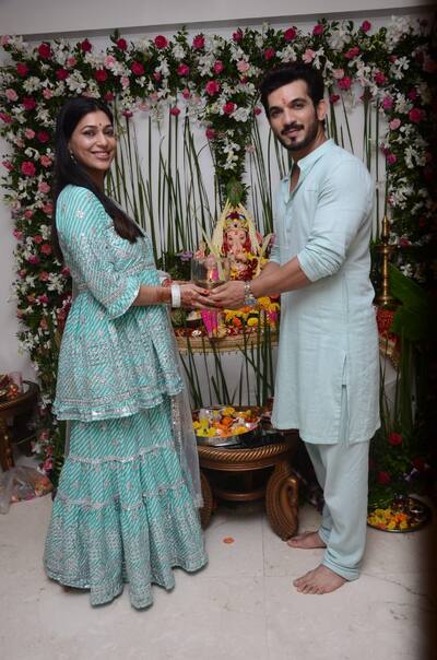 Arjun Bijlani and his wife celebrating Ganesh Chaturthi