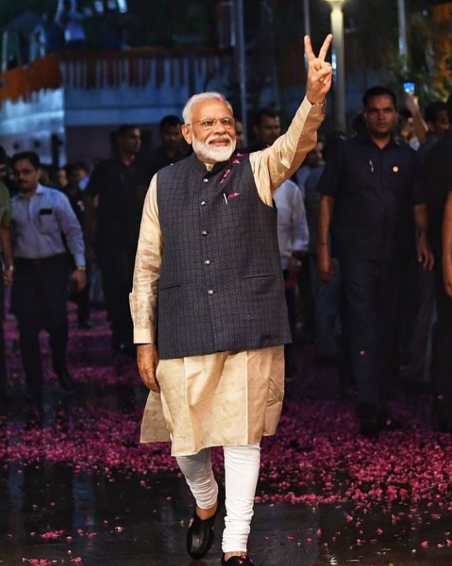 PM Modi stuns in a golden kurta, black Nehru jacket