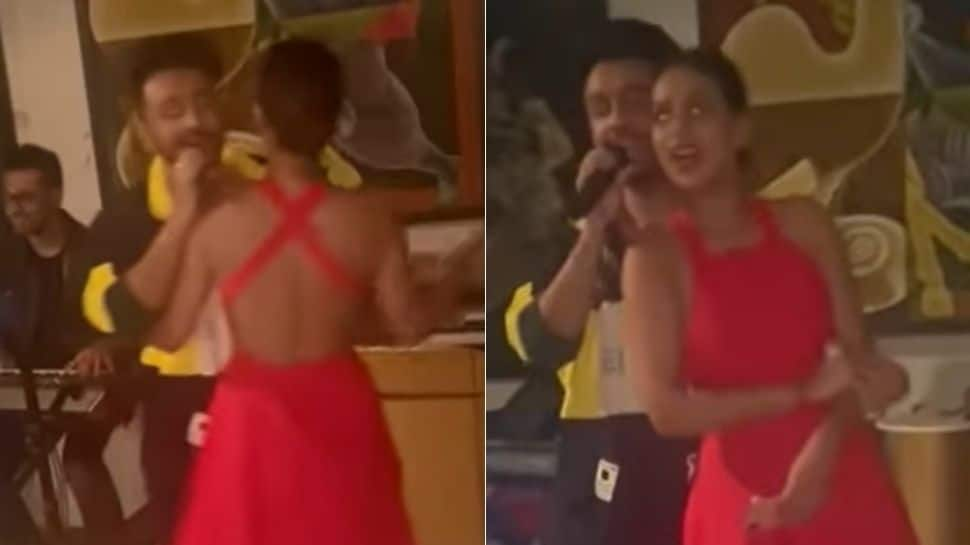 Nia Sharma sizzles in red hot, backless dress as she slow dances with Tony Kakkar! - Watch