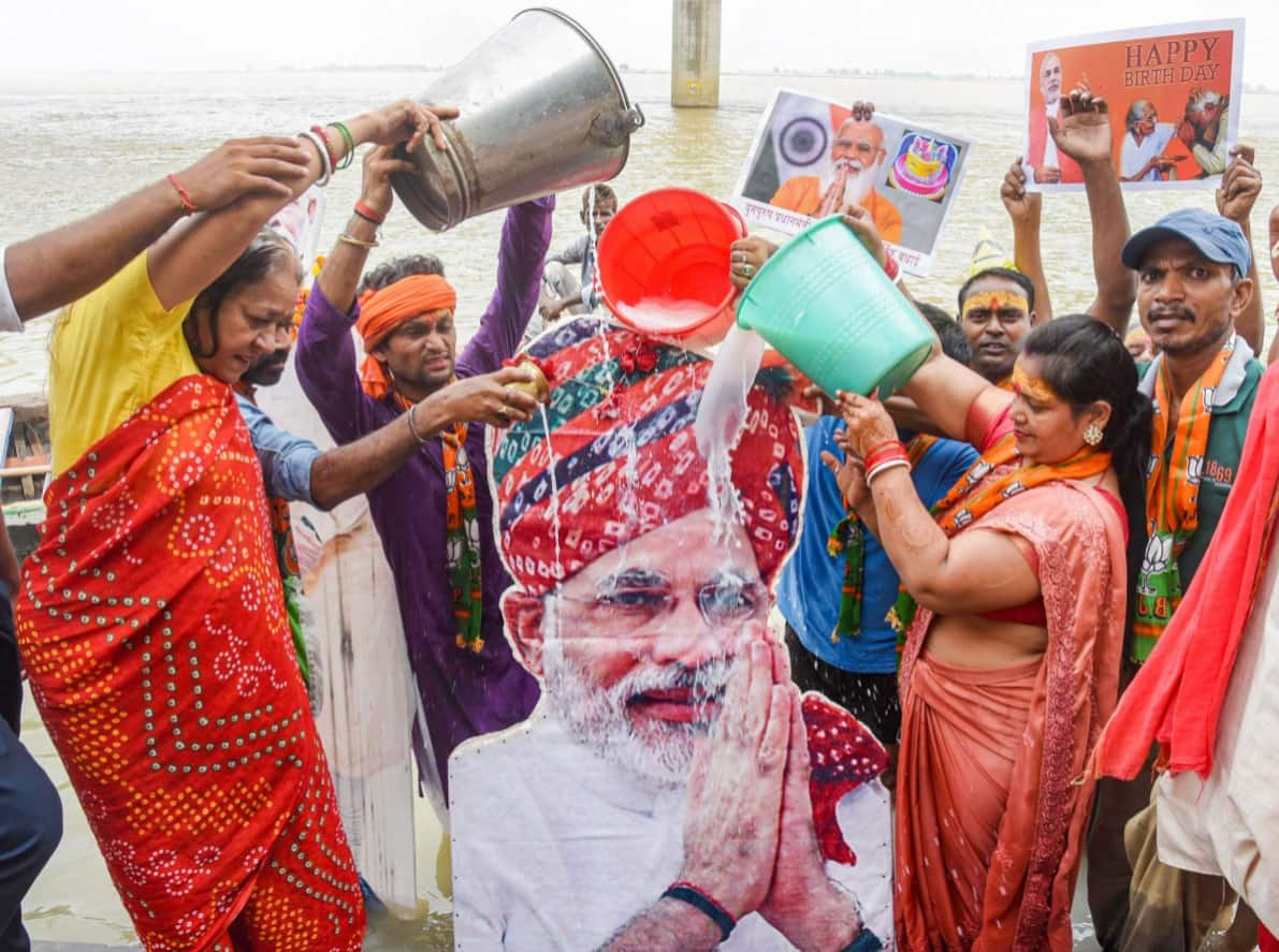 Supporters perform rituals on the banks of Ganga