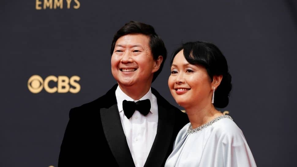 Ken Jeong and Tran Jeong pose for cameras