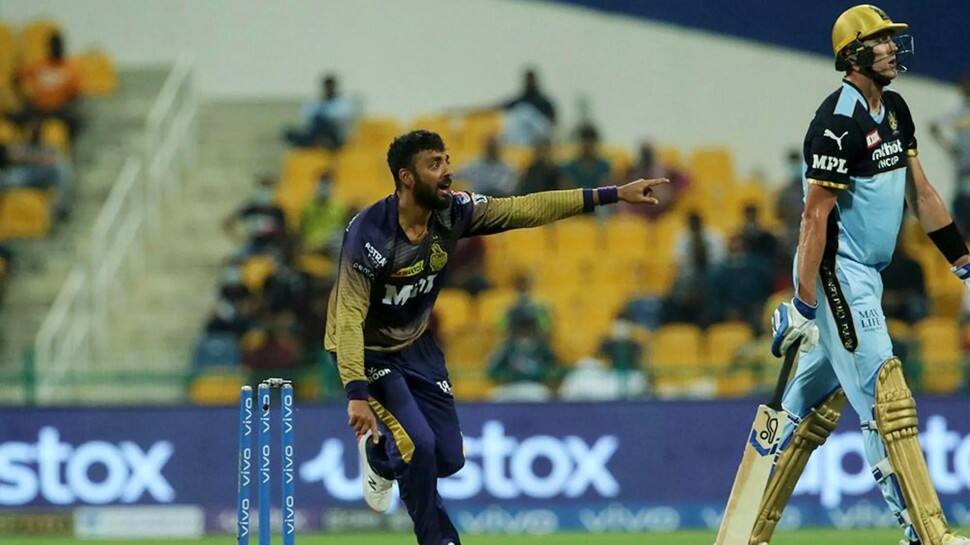 KKR mystery spinner Varun Chakravarthy celebrates after picking up a wicket against RCB in the IPL 2021 match in Abu Dhabi. (Photo: ANI)