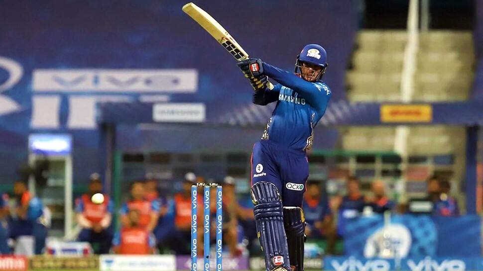 Mumbai Indians wicketkeeper batsman Quinton de Kock smashes a boundary against Punjab Kings in their IPL 2021 match in Abu Dhabi. (Photo: ANI)