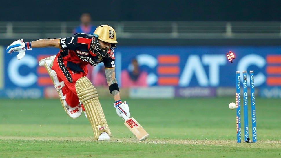 Royal Challengers Bangalore skipper Virat Kohli gets run out against Rajasthan Royals in their IPL 2021 tie. (Photo: ANI)