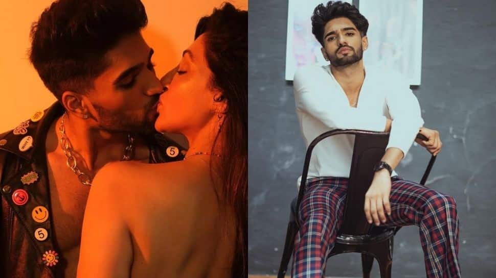 Bigg Boss OTT fame Zeeshan Khan confirms dating Reyhna Pandit, gives her a kiss in mushy picture!