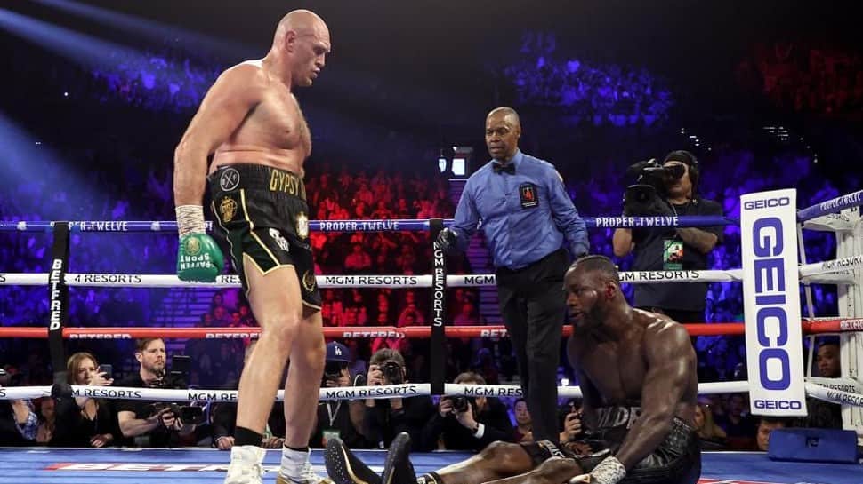 Tyson Fury knocks out Deontay Wilder to retain WBC heavyweight title - WATCH