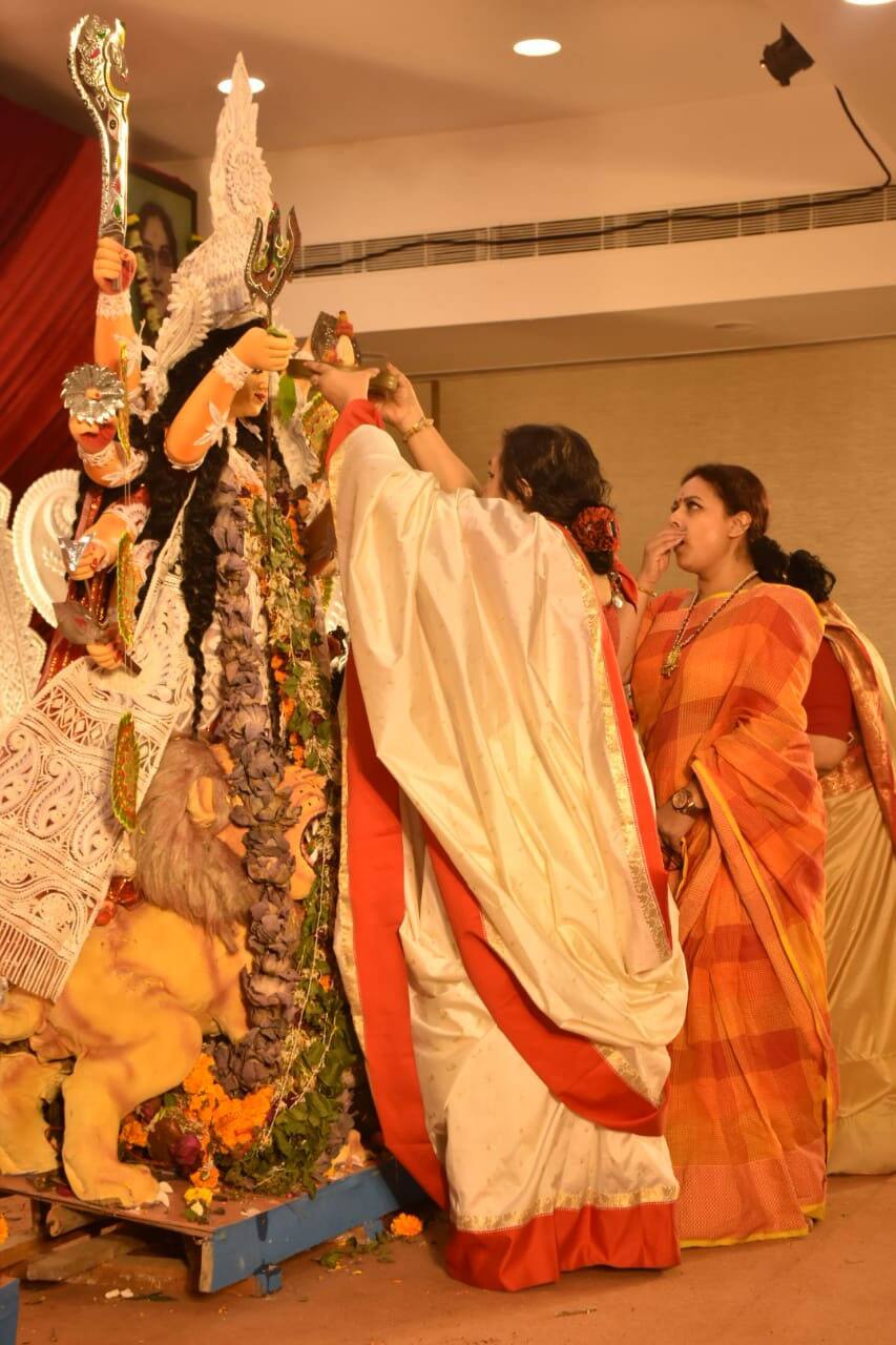 Sharbani Mukherji performs rituals at Durga Puja festivity