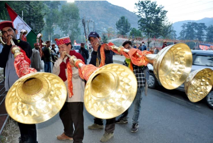Devotees grace the festival with traditional instruments