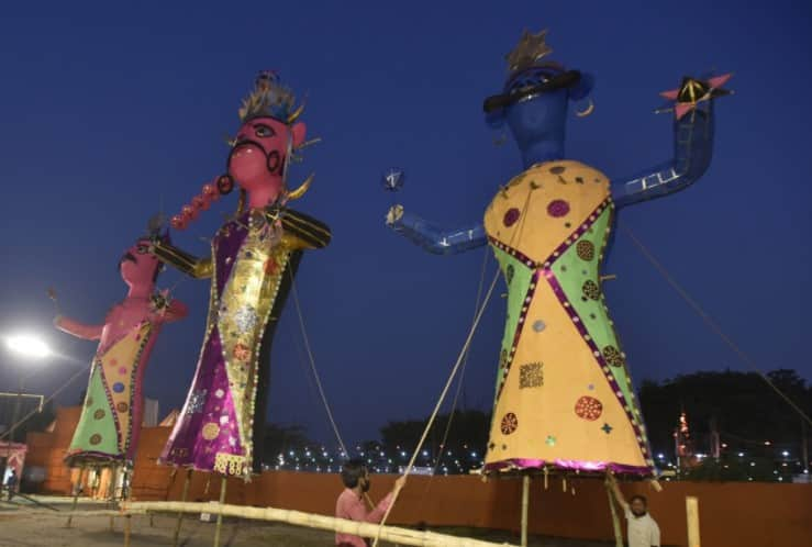 Ahead of the main event, people give final touch to effigies of Ravana