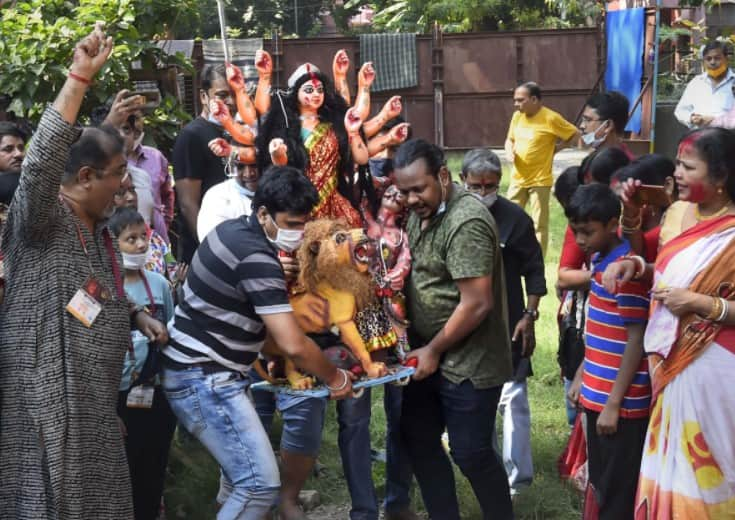 Devotees take Goddess Durga's idol for immersion