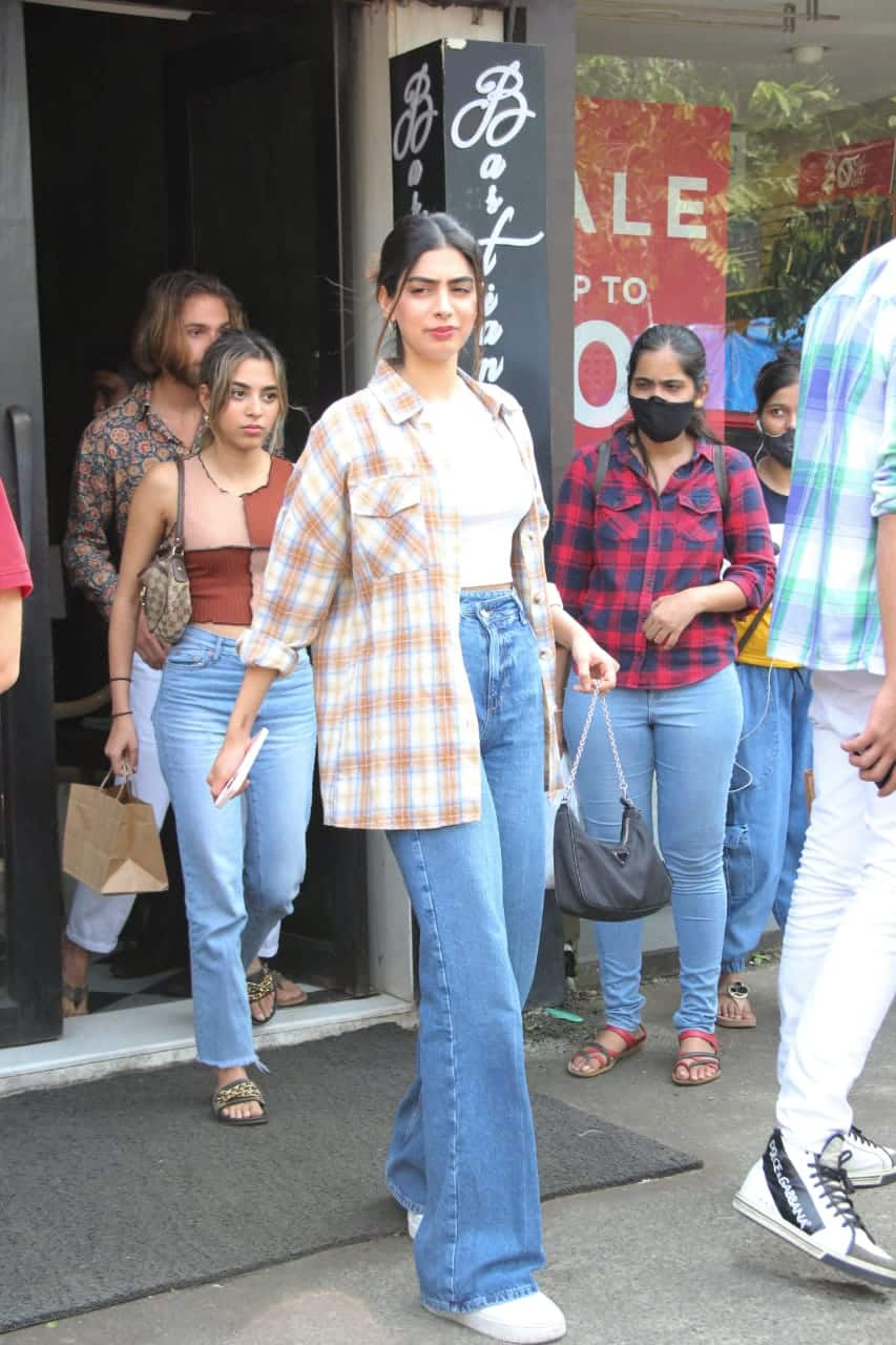 Khushi rocked a plaid shirt with red lipstick