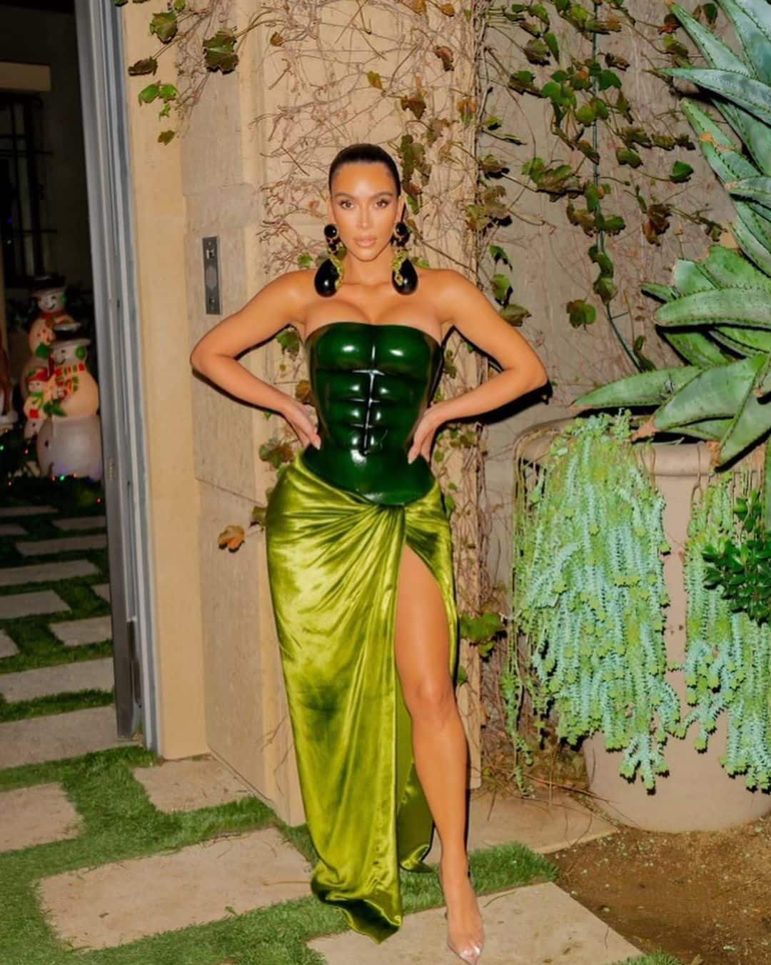 Kim Kardashian wears a hard corset dress for Christmas