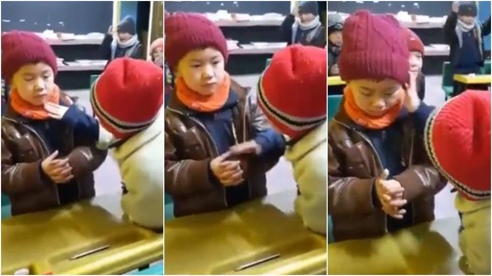 Little girl consoles fellow classmate, heartwarming video wins hearts online - Watch