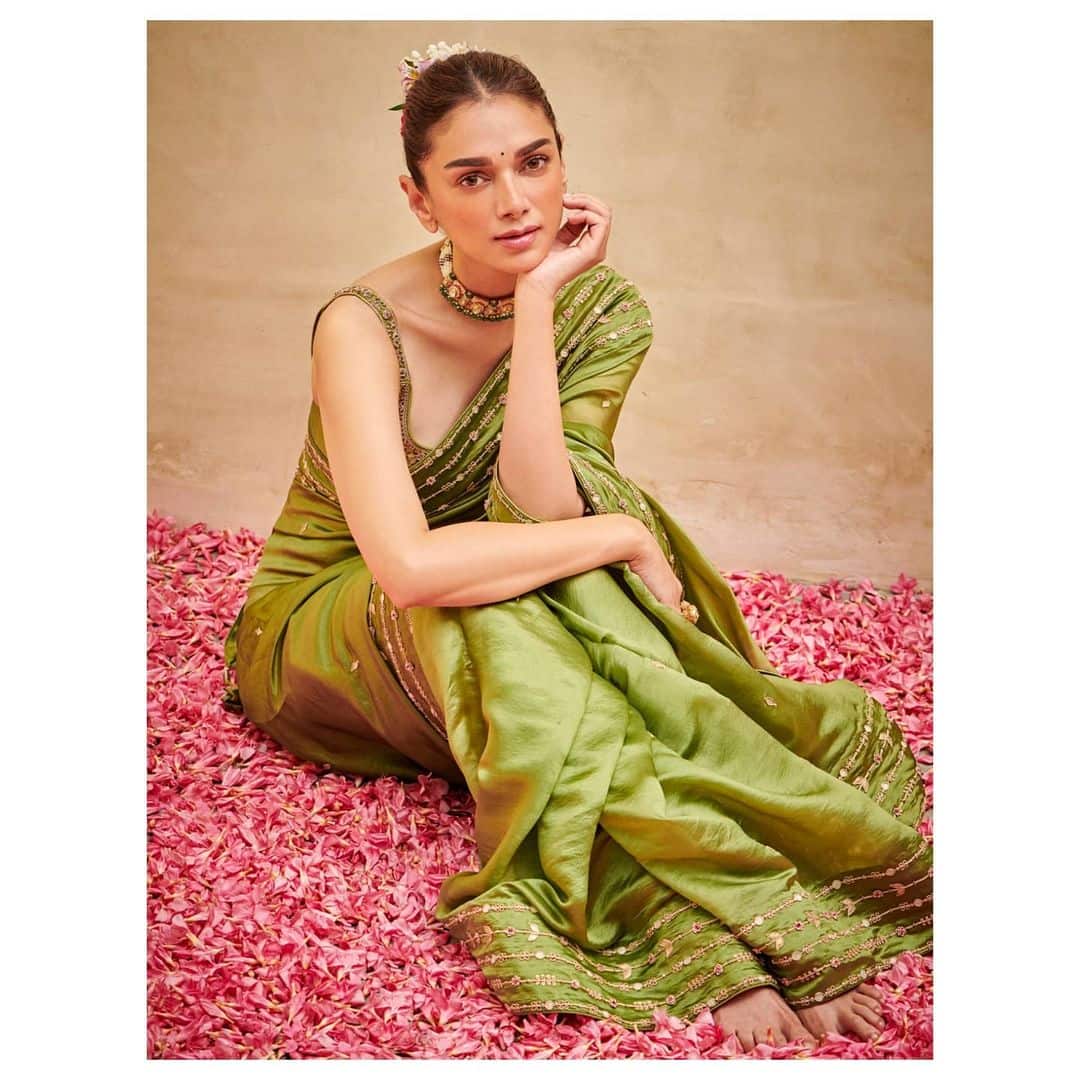 Aditi looks majestic in lime green colour sleeveless saree