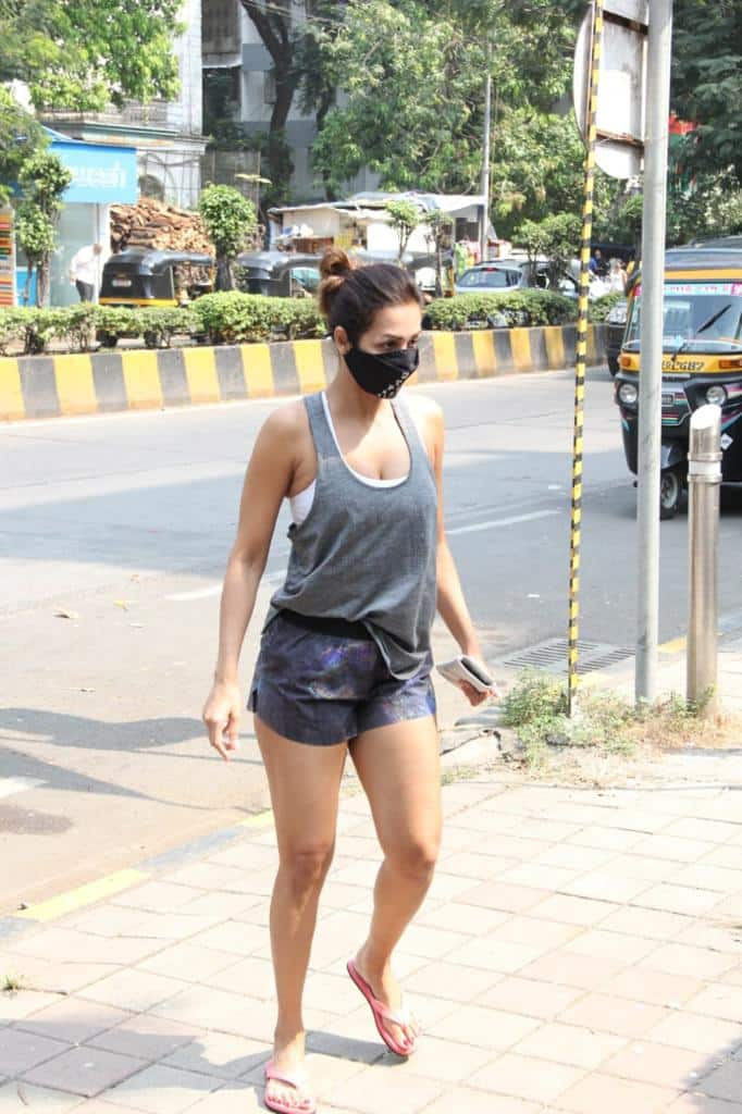 Malaika Arora wears grey ganji and electric blue shorts