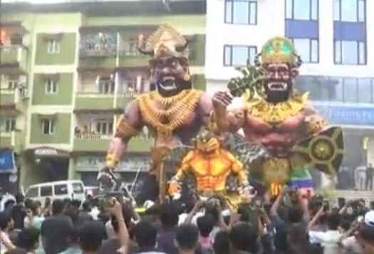 Devotees burn an effigy of Narakasura