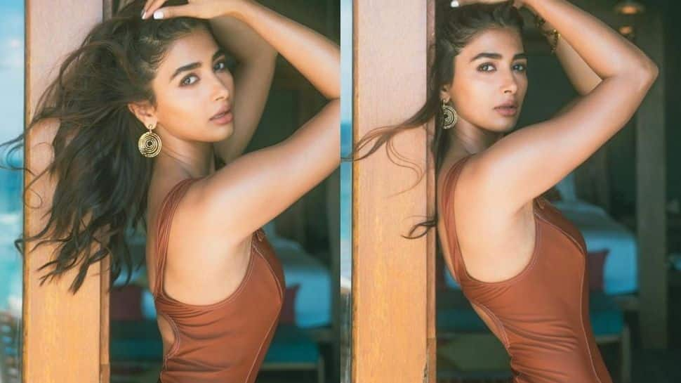 Pooja Hegde is a 'biscuit dipped in caramel' in smouldering swimsuit pics!