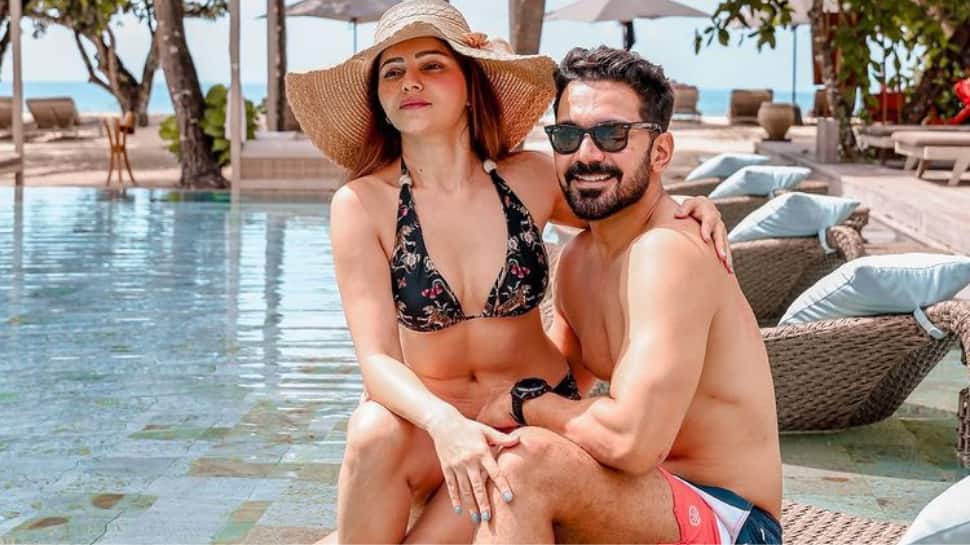 Rubina Khan Ki Sex Video - Abhinav Shukla shares sizzling photo of himself and Rubina Dilaik by the  pool, Nikki Tamboli reacts | Television News | Zee News