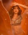 Nora Fatehi looks like a dream in orange lehenga set