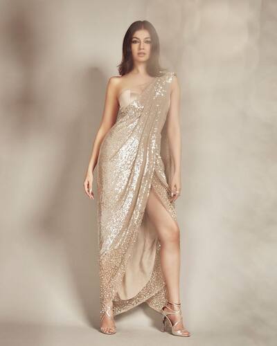 Divya Khosla Kumar stuns in a sparkly thigh-high slit saree gown