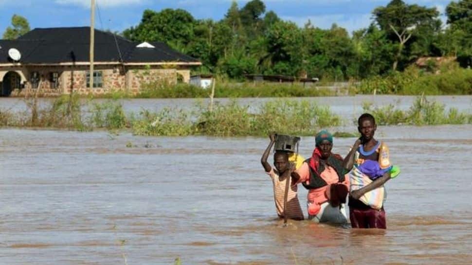 At least 20 killed as flood water sweeps bus in Kenya