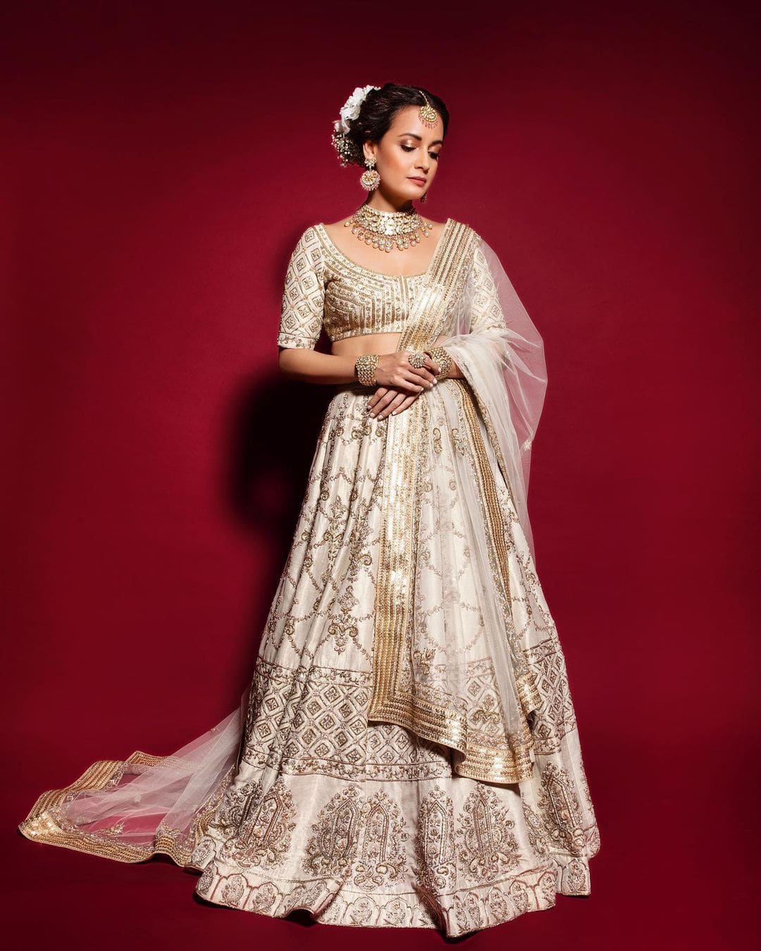 Dia Mirza is elegance personified in a white and gold lehenga set