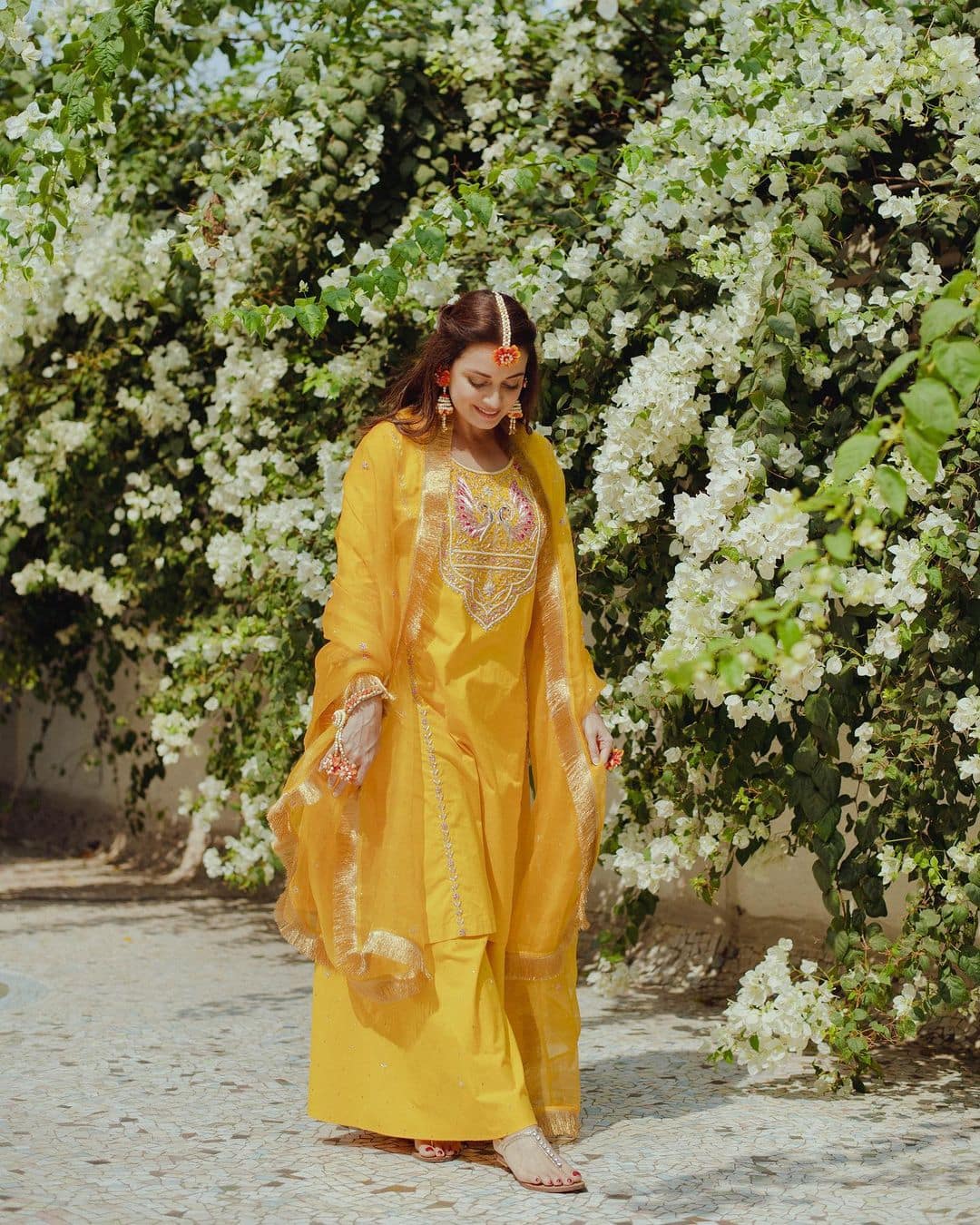 Dia looks lovely in a yellow sharara set