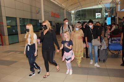 Kat's family was clicked at the airport on Friday