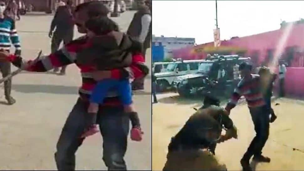 Kanpur cop suspended after video of him hitting man with child in arms in Uttar Pradesh goes viral