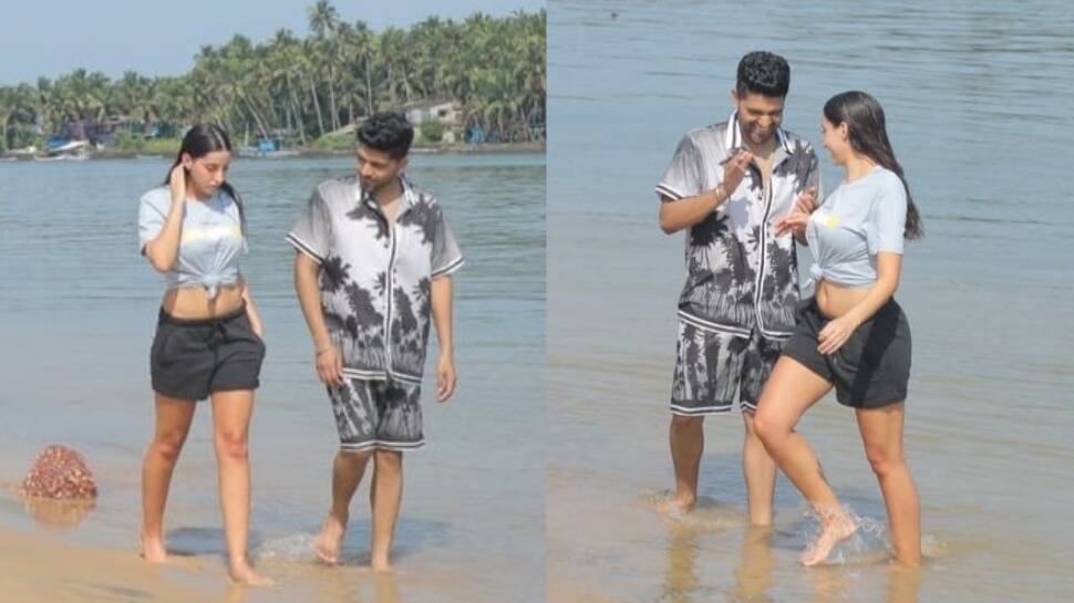 Nora Fatehi and Guru Randhawa enjoy stroll at a secluded Goa beach, fans ask 'are you dating'? | People News - Vimarsana News