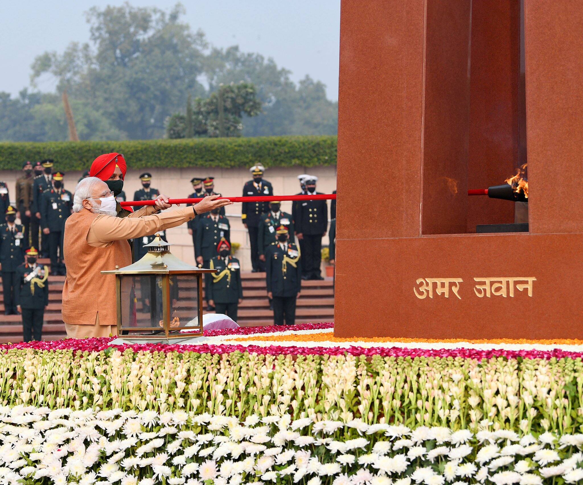 PM Modi lights 'Swarnim Vijay Mashaal' in New Delhi.