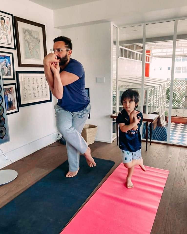 Taimur does yoga with daddy Saif
